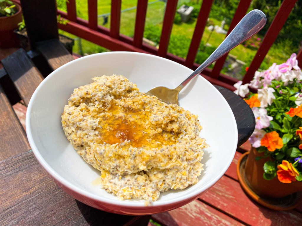 A picture of oatmeal for getting in shape again topped with honey.