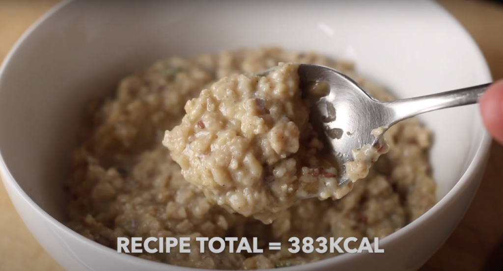 The oatmeal on a spoon with text that reads '383kcal'