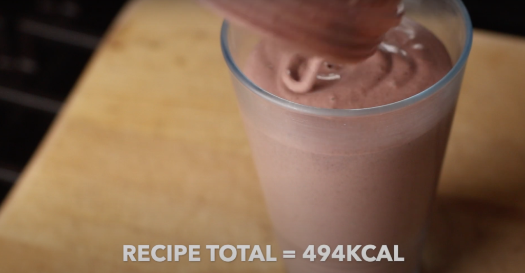 A picture of the final cherry protein shake with text that reads '494kcal'