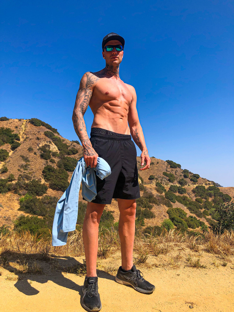 Personal trainer Jakob Roze outside exercising to show the best way to lower blood sugar and A1C levels is by being fit. 