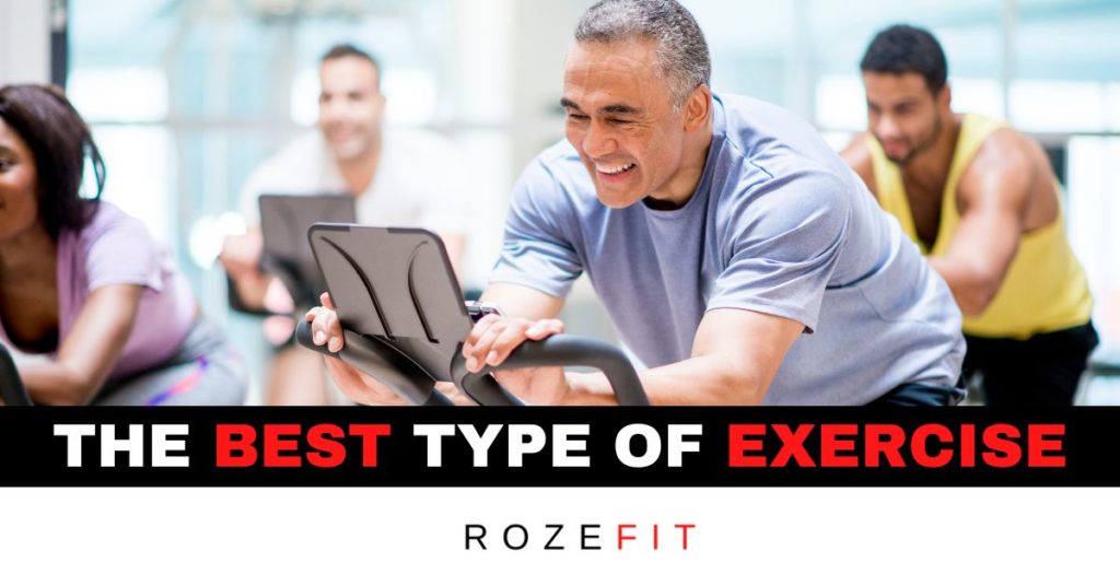 A middle-aged man using an exercise bike smiling with text below that reads "the best type of exercise"