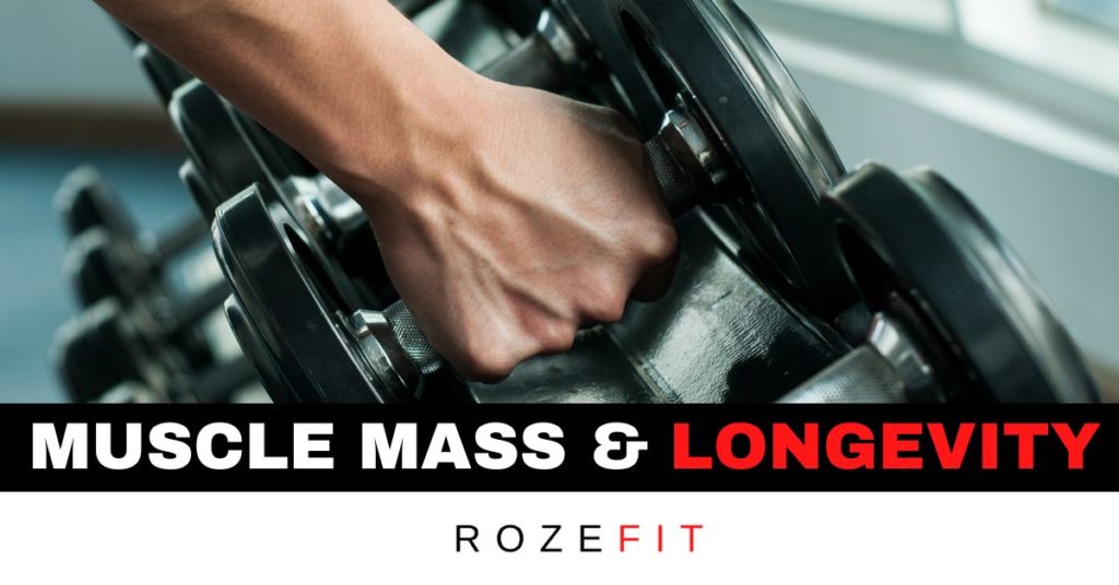 Text that read muscle mass & longevity with a picture of a hand grabbing weights.